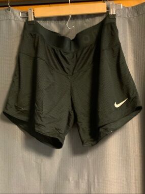 Nike Women's Black Mesh Athletic Shorts with White Swoosh